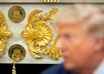 Trump casts his presidential legacy in gold and marble