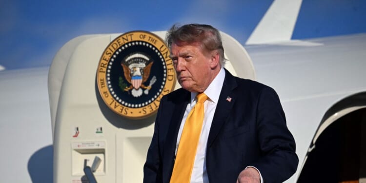 President Donald Trump steps off Air Force One at Morristown Municipal Airport in Morristown, New Jersey, on Sept. 4, 2026.