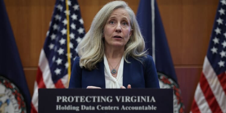 Virginia Democratic Gov. Abigail is pictured in a Sept. 18 file photo from a news conference where the lectern was adorned with the slogan, "Protect Virginia."
