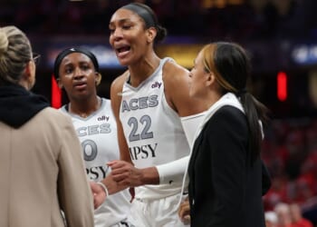 A'ja Wilson #22 of the Las Vegas Aces is visibly upset after entering the stands to confront a fan Tuesday during game two of the first round of the WNBA Playoffs against the Indiana Fever at Gainbridge Fieldhouse in Indianapolis, Indiana.