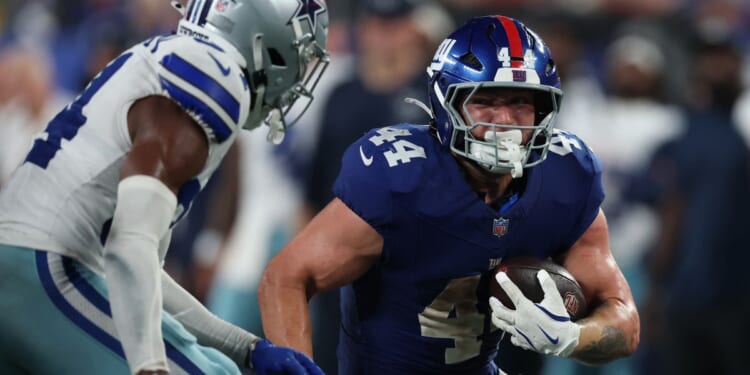 Cam Skattebo of the New York Giants runs the ball during the fourth quarter against the Dallas Cowboys at MetLife Stadium on Sept. 13, 2026, in East Rutherford, New Jersey.
