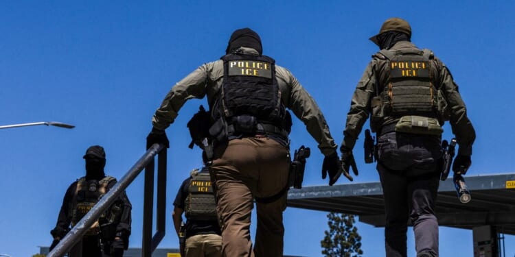 Immigration and Customs Enforcement agents walk outside the Ventura County Government Center in Ventura, California, on July 27, 2026.