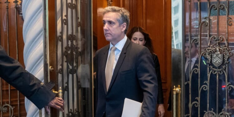 Michael Cohen, former personal lawyer to President Donald Trump, leaves his apartment building on his way to Manhattan Criminal Court on May 16, 2024, in New York City.