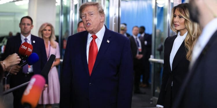 President Donald Trump speaks to members of the media Tuesday as he arrives during the 81st United Nations General Assembly at the United Nations Headquarters in New York.