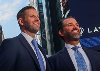 Eric Trump, left, and his brother Donald Trump Jr. are pictured in New York City's Times Square in 2025.