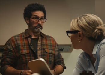 A dumb-looking man and a girlboss wife in a scene from Apple's ad for its new HomeView product.