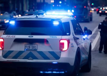 Chicago Police Department officers respond to the scene of an incident on March 29, 2022.