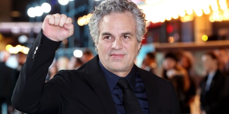 Actor Mark Ruffalo raises his fist at a UK gala screening on Jan. 28, 2026 in London, England.