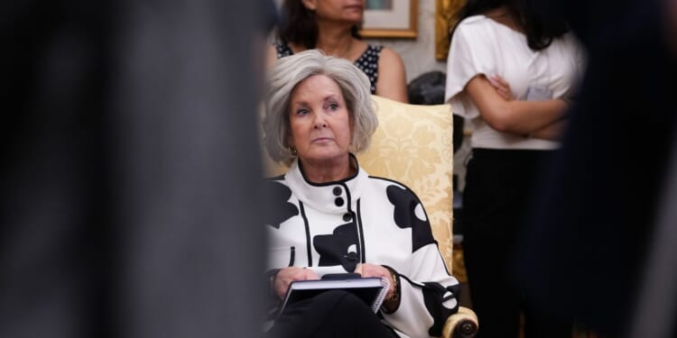 White House Chief of Staff Susie Wiles looks on as President Donald Trump speaks in the Oval Office of the White House in Washington on Sept. 4, 2026.