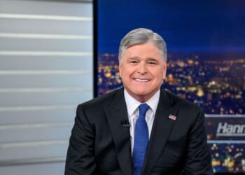 Host Sean Hannity poses as Vice President J.D. Vance visits the show "Hannity" at Fox News Channel Studios on June 15, 2026, in New York City.