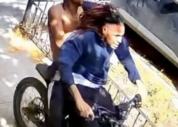 A photograph of two suspects in an Oct. 2 robbery posted by NYPD Crime Stoppers.