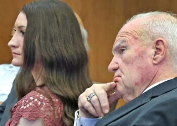 Massachusetts murder suspect Lindsay Clancy and her lawyer, Kevin Reddington, appear at a status hearing Sept. 29 at the Plymouth County Superior Court in Plymouth, Massachusetts.