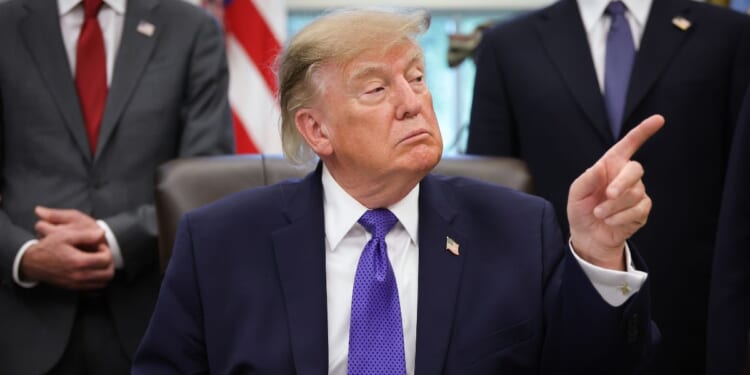 President Donald Trump answers questions from reporters during an announcement in the Oval Office at the White House on Sept. 28, 2026, in Washington, D.C.