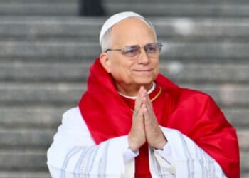 Pope Leo XIV gestures during a visit at the Maqam Echahid Martyrs' Monument in El Madania, near Algiers, on April 13, 2026.