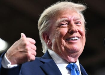 President Donald Trump speaks on stage at a campaign rally Saturday in Vandalia, Ohio.