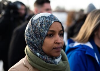 Rep. Ilhan Omar and Rep. Angie Craig arrive outside of the regional ICE headquarters at the Bishop Henry Whipple Federal Building on Jan. 10, 2026, in Minneapolis, Minnesota.