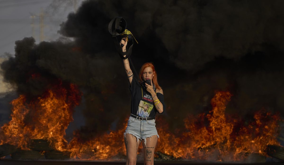 Protesters in Israel demand release of hostages as Gaza airstrikes kill 16, hospitals say