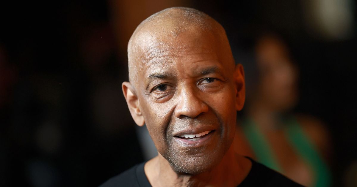 Actor Denzel Washington smiles at a special screening of "Highest 2 Lowest" in Los Angeles on Aug. 13, 2025.