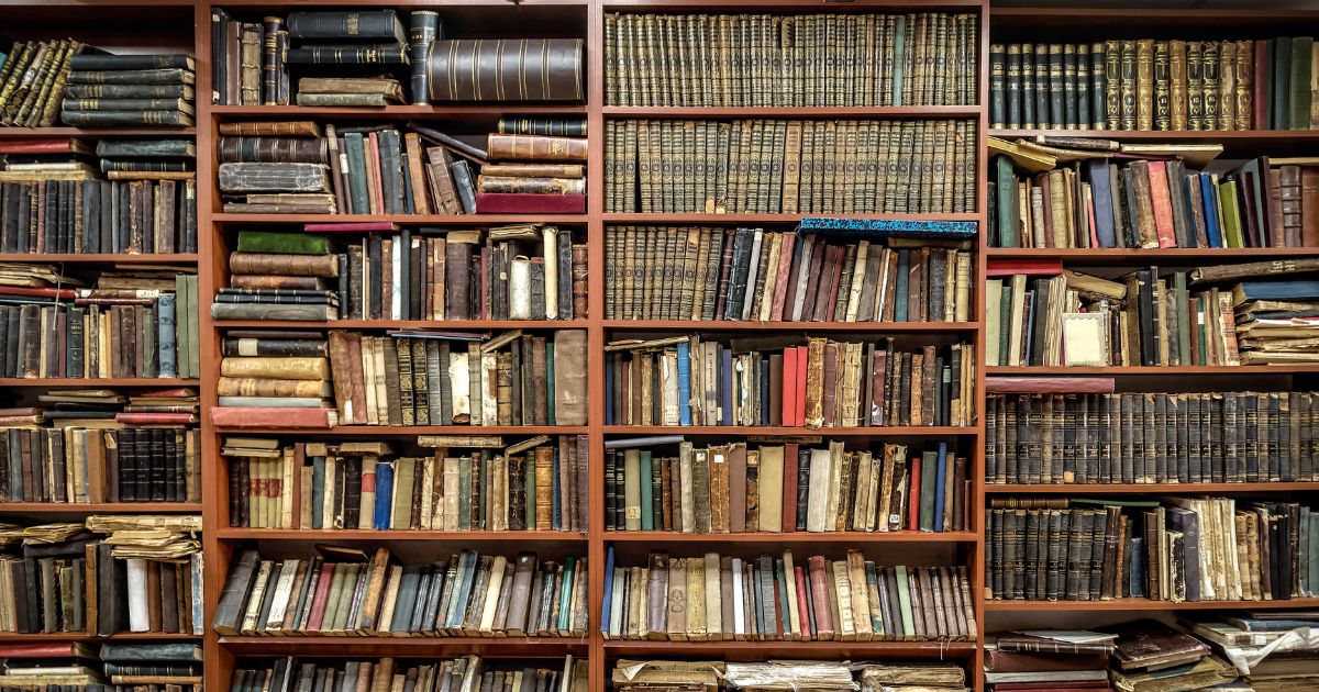 Old books on shelves.
