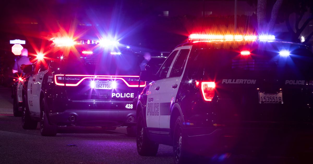 Fullerton Police Department units respond to the scene of a nighttime emergency in Fullerton, California, on Dec. 11, 2022.