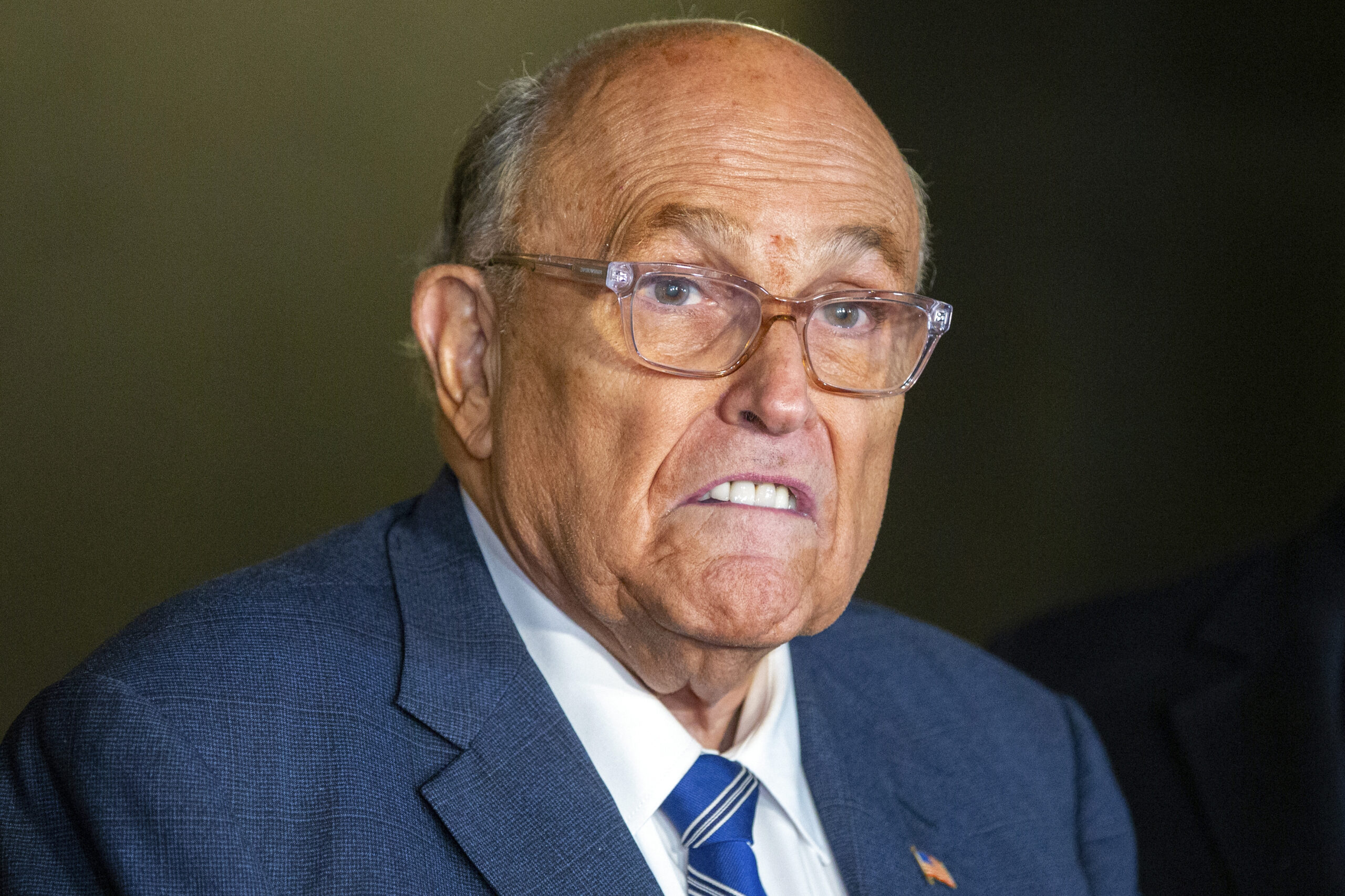 Former New York City mayor Rudy Giuliani speaks to media outside a federal court in New York on Jan. 3, 2025.