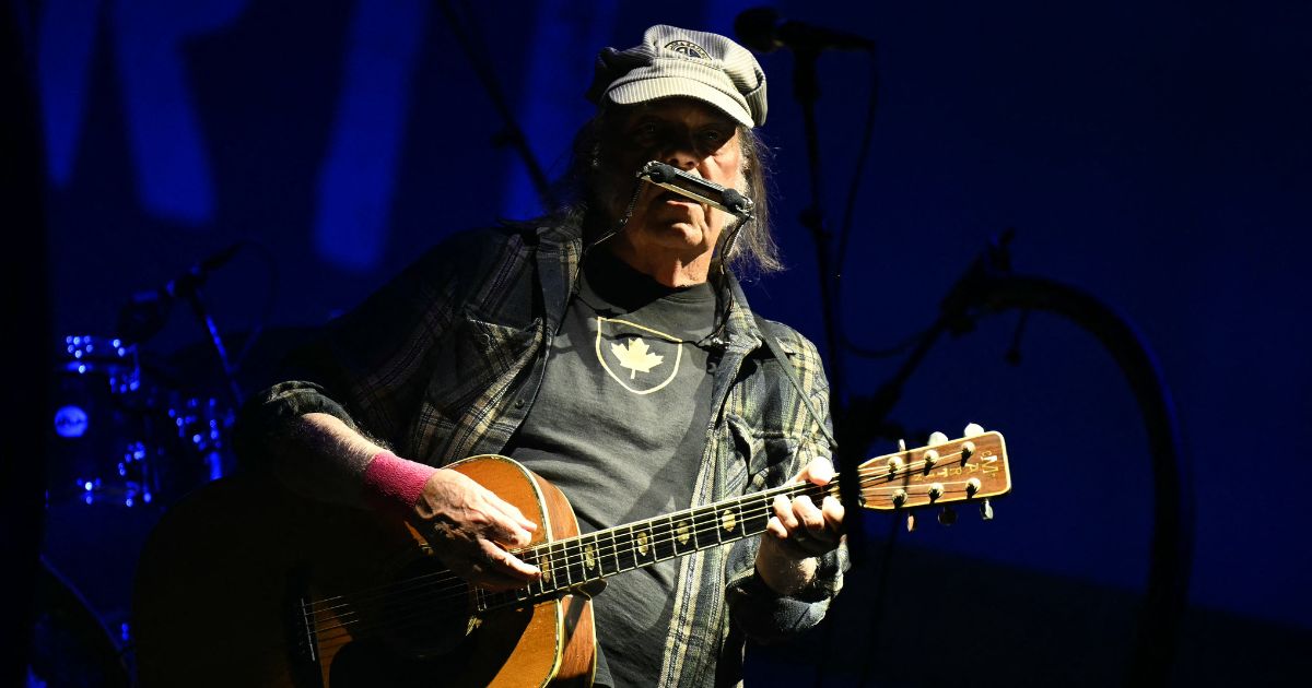 Canadian singer Neil Young performs on the pyramid stage on the fourth day of the Glastonbury festival at Worthy Farm in the village of Pilton in Somerset, southwest England, on June 28, 2025.