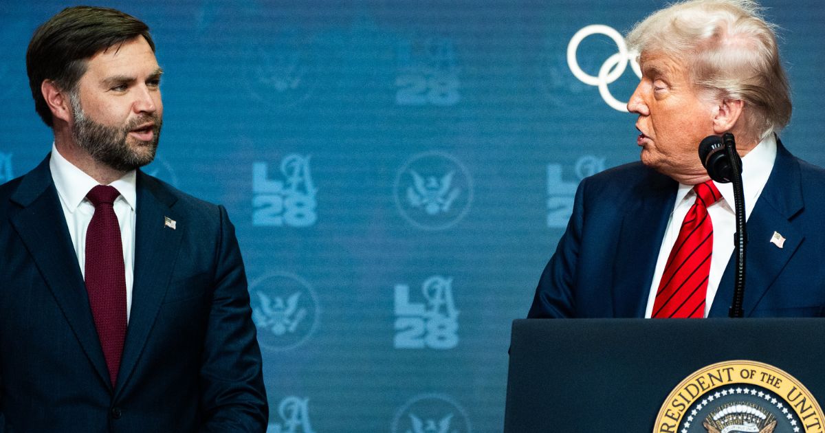 President Donald Trump speaks with Vice President J.D. Vance during an event regarding the 2028 Los Angeles Olympic Games in Washington, D.C., on Tuesday.