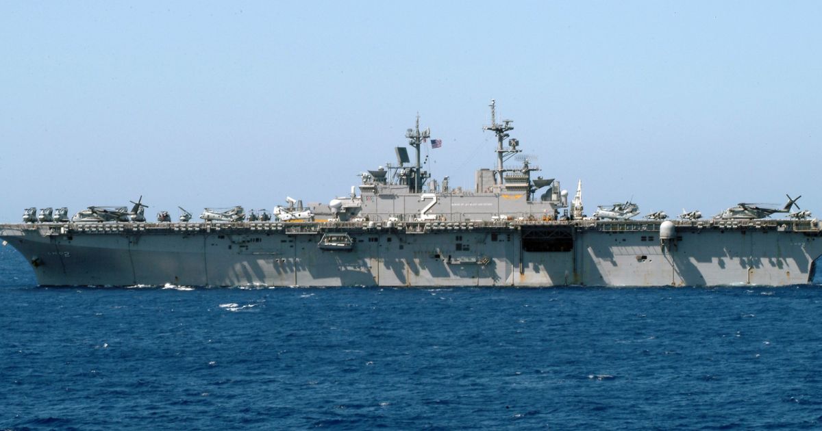 The amphibious assault ship USS Essex returns to sea Feb. 17, 2006, shortly after arriving in Subic Bay, Philippines.