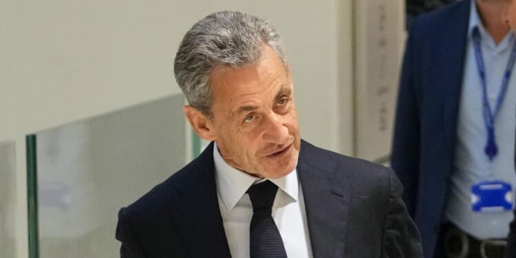 Court sentences ex-French President Nicolas Sarkozy to 5 years in prison in campaign-financing trial