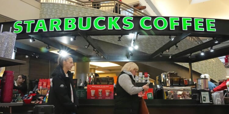 Starbucks to close stores, lay off 900 non-retail workers as part of turnaround plan
