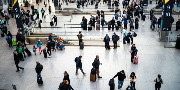 Off-duty officer shoots and wounds man inside New York City's Penn Station, police say
