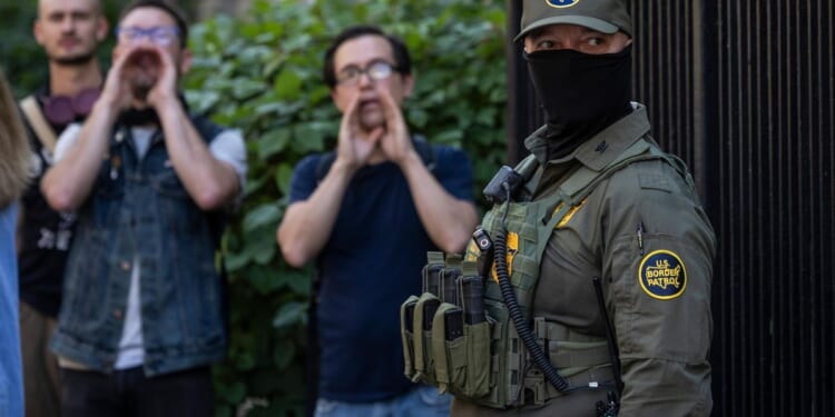 Judge calls for public to 'stand up' to Trump, compares ICE to KKK