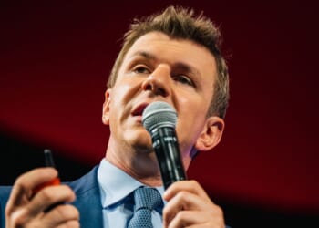 Investigative journalist James O'Keefe, seen in a 2021 photo, said Charlie Kirk challenged him to train college students to report on abuses at their college campuses.