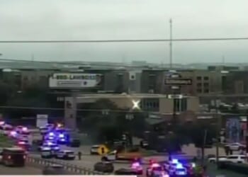 Police respond to the scene of a shooting at an ICE facility in Dallas, Texas, on Wednesday.