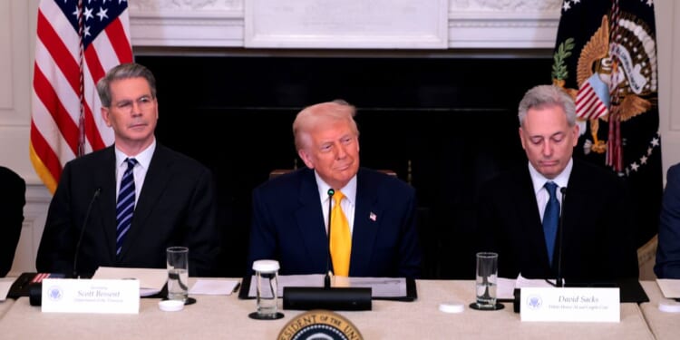 President Donald Trump speaks alongside Treasury Secretary Scott Bessent and White House Crypto Czar David Sacks at the White House Digital Assets Summit on March 7, 2025, in Washington, D.C.