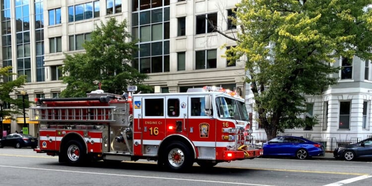 A fire engine on Oct. 19, 2022, at the corner of Massachusetts Ave. NW and 13th St. NW, in Washington, D.C.
