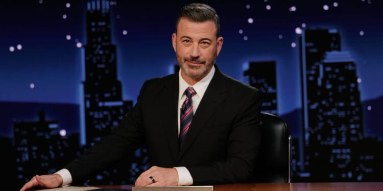 This image released by Disney shows Jimmy Kimmel hosting his late night show “Jimmy Kimmel Live!” in Los Angeles on Tuesday.