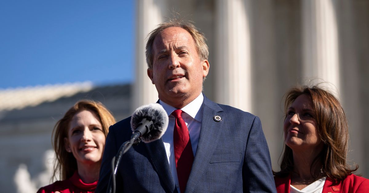 Texas Attorney General Ken Paxton speaks outside the Supreme Court on Nov. 1, 2021, in Washington, D.C.