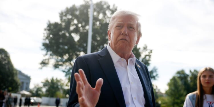 President Donald Trump speaks to members of the media as he departs the White House on Sept. 26, 2025, in Washington, D.C.