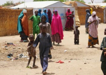 Women and children displaced by Boko haram attacks are seen outside a camp in Dikwa, north east Nigeria, April 29.