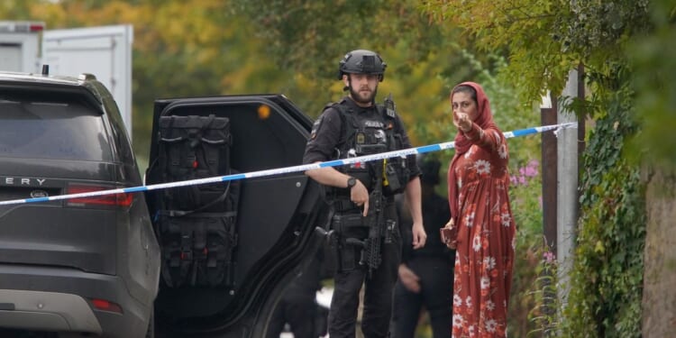 One of the victims in Manchester synagogue attack may have been killed by a bullet fired by police