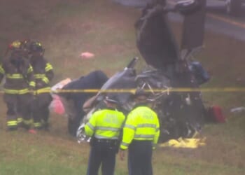 Small plane crashes onto a Massachusetts highway, killing 2 and wounding 1 on the ground