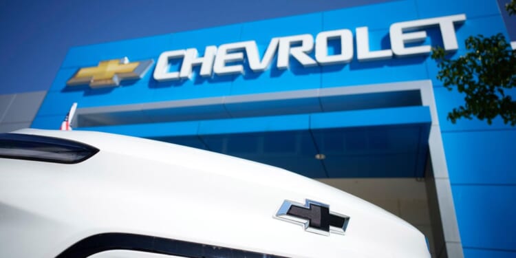 GM to take a $1.6B hit as tax incentives for electric vehicles are slashed and emission rules ease