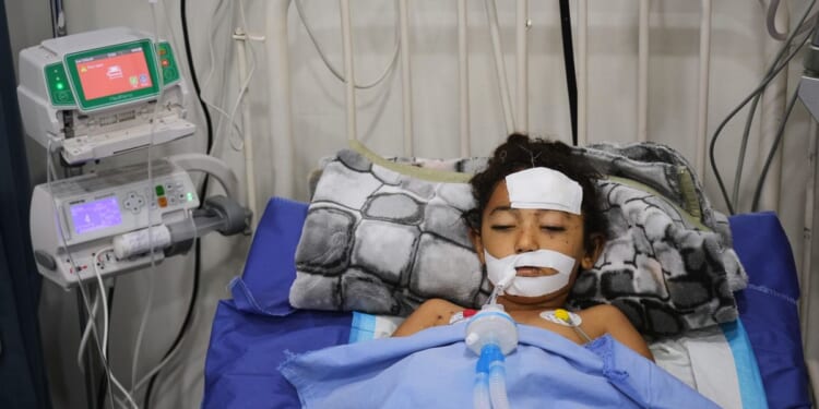 A bomb in Gaza's rubble wounds twins who thought it was a toy