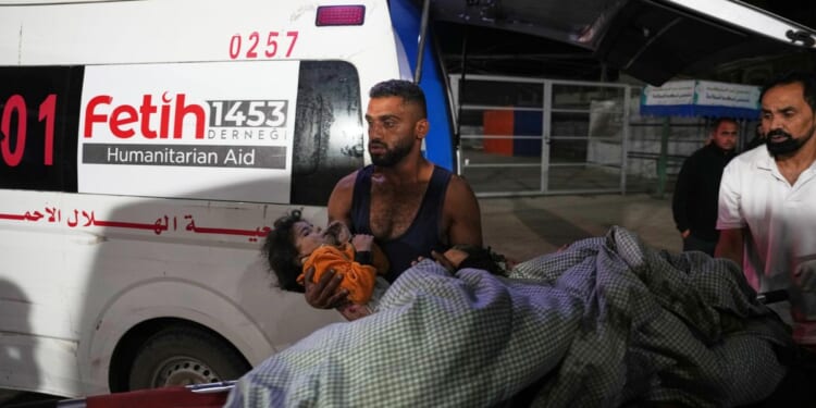 Israel says ceasefire is back on as death toll from overnight strikes in Gaza reaches 104