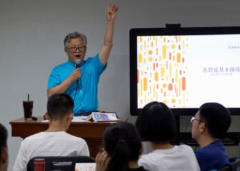 Pastor Jin Minri leads a class on the basics of Christian beliefs at the Zion Church in Beijing, China, on Aug. 4, 2018.
