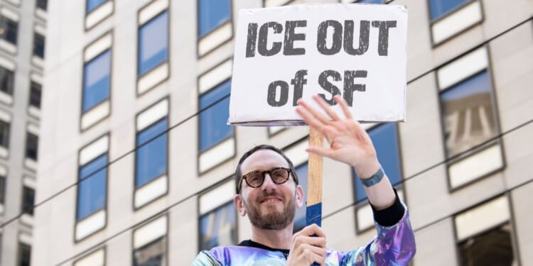 California State Sen. Scott Weiner waves to onlookers during the Pride Parade on June 29, 2025, in San Francisco, California.