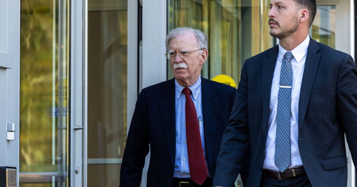 Former U.S. National Security Advisor John Bolton leaves federal court after pleading not guilty to charges of mishandling classified material on Oct. 17, 2025, in Greenbelt, Maryland.