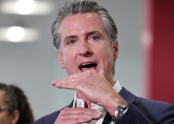 California Governor Gavin Newsom speaks to the media at Belvedere Middle School in Los Angeles on Oct. 8, 2025.