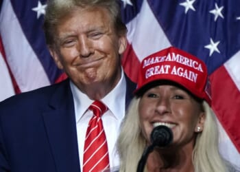 Rep Marjorie Taylor Greene, right, speaks alongside then-presidential candidate Donald Trump, left, at a campaign event in Rome, Georgia, on March 9, 2024.